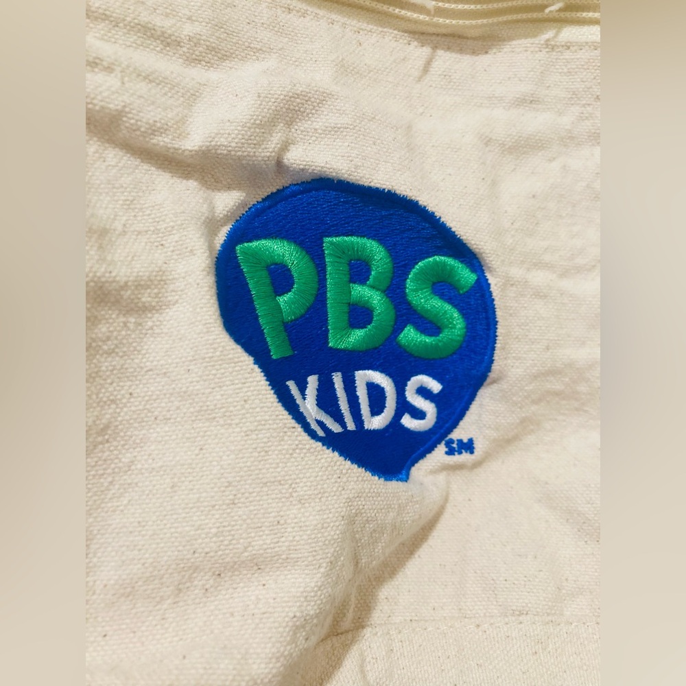 PBS Kids Cream Tote Bag: Little paint on one handle otherwise like new! - Picture 4 of 5